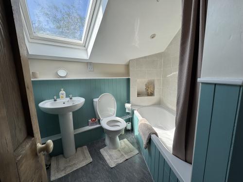 Upstairs bathroom and WC